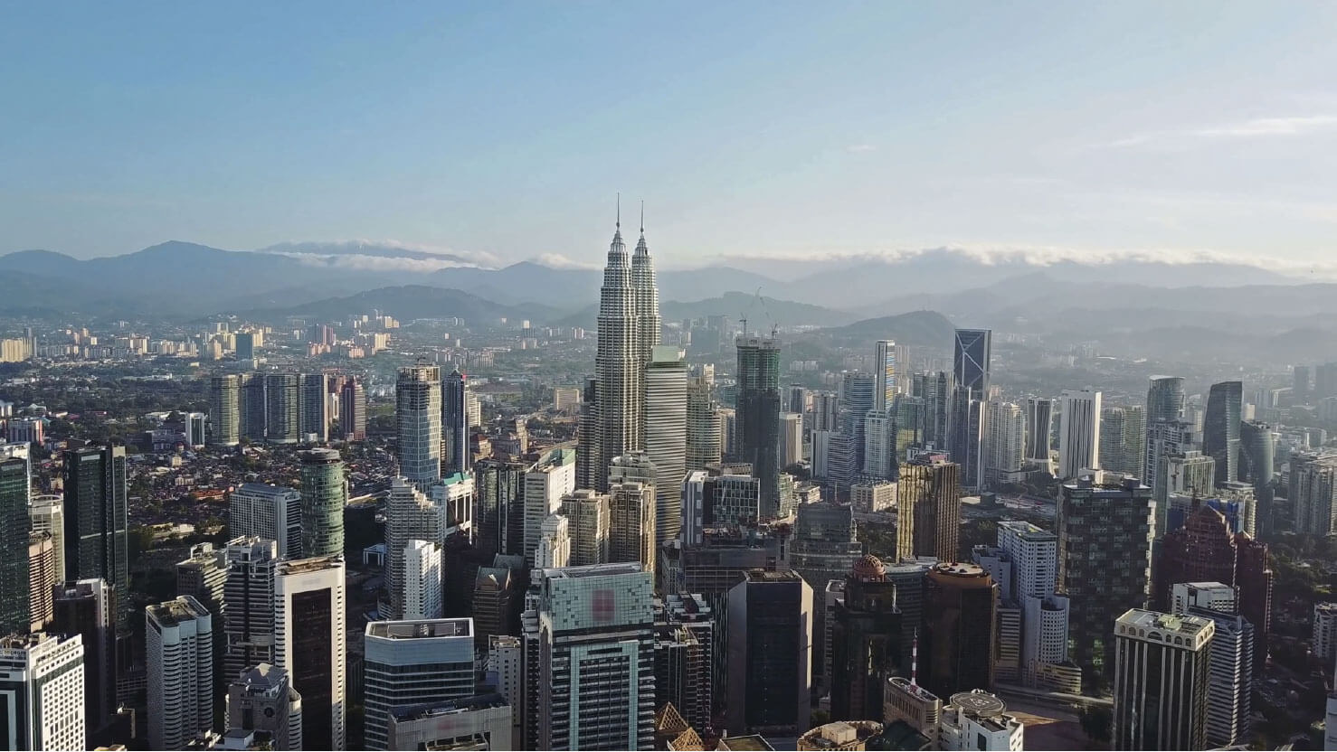 Kuala Lumpur from the air, the Petronas Towers at its centre
